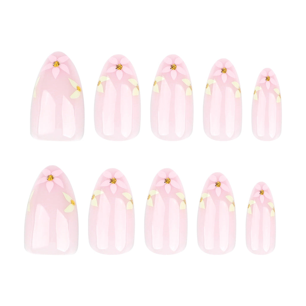 press on nails babyboomer nude avec fleurs manucure naturelle elegante