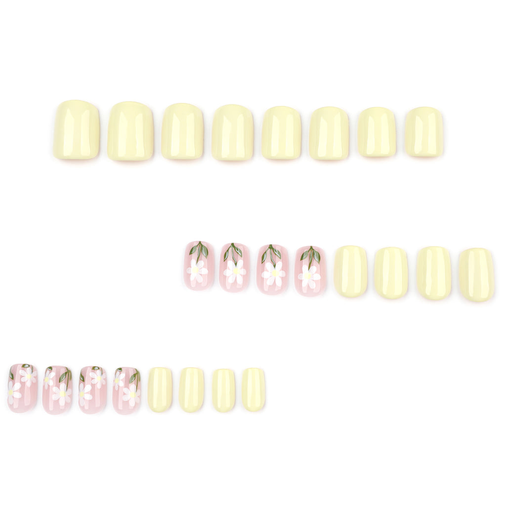 faux ongles jaune pastel fleurs sur ongles ongles carré court printemps popnails